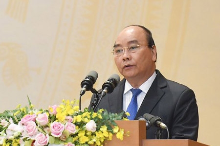 Thủ tướng Nguyễn Xuân Phúc phát biểu tại hội nghị. Ảnh: Chụp từ màn hình