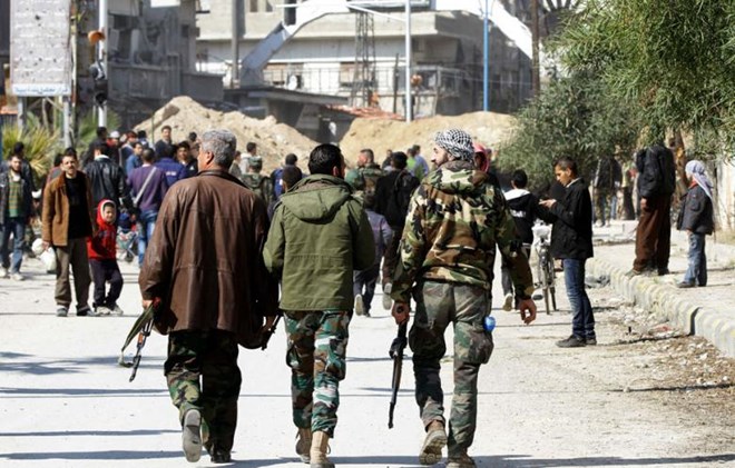 Hàng trăm phiến quân đối lập ở Syria ra đầu hàng chính phủ