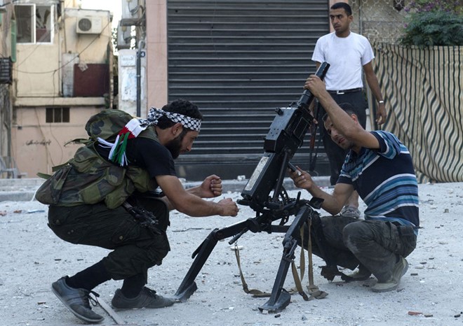 Tổng thống Assad: Kẻ thù ồ ạt chuyển vũ khí cho phe nổi dậy Syria
