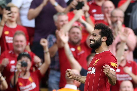 Mohamed Salah ăn mừng sau khi ghi bàn cho Liverpool - Ảnh: REUTERS