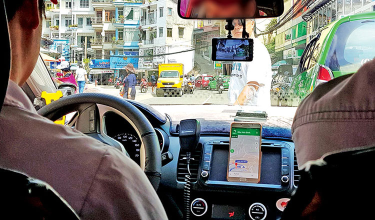 Cho phép triển khai thí điểm Grab taxi nhưng kiểm soát chặt chẽ