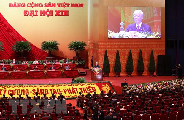 Đại hội nghe Tổng Bí thư Ban Chấp hành Trung ương Đảng, Chủ tịch nước CHXHCN Việt Nam Nguyễn Phú Trọng đọc Báo cáo chính trị của Ban Chấp hành Trung ương Đảng khóa XII và các văn kiện trình Đại hội.