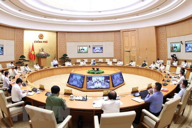 Quang cảnh hội nghị trực tuyến tại trụ sở Chính phủ.