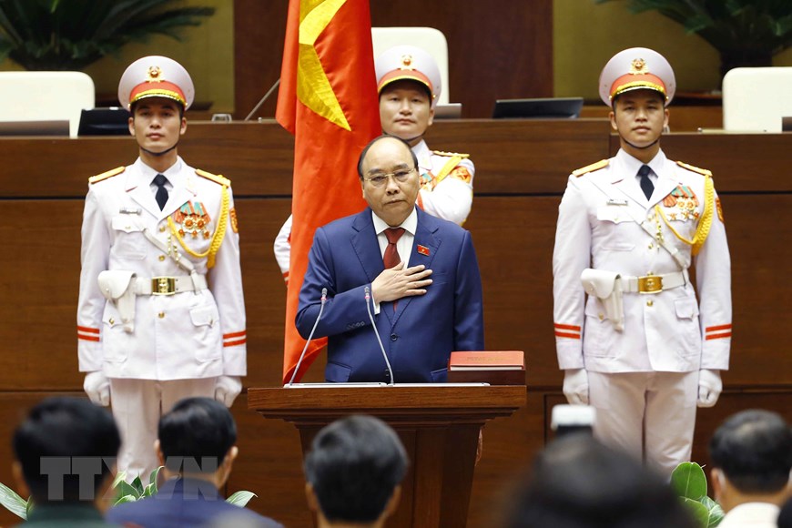 Chủ tịch nước Nguyễn Xuân Phúc tuyên thệ nhậm chức trước Quốc hội, đồng bào và cử tri cả nước. (Ảnh: Thống Nhất/TTXVN)
