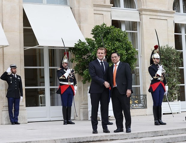 Thủ tướng Chính phủ Phạm Minh Chính và Tổng thống Cộng hòa Pháp Emmanuel Macron