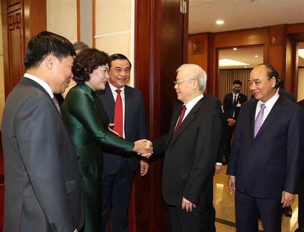 Tổng Bí thư Nguyễn Phú Trọng, Chủ tịch nước Nguyễn Xuân Phúc và các đại biểu dự bế mạc hội nghị. (Ảnh: Trí Dũng/TTXVN)